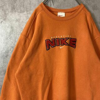 ナイキ(NIKE)の【usa製、センターフロッキー刺繍ロゴ】NIKEスウェット古着オレンジsk8L(スウェット)