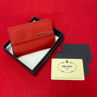 プラダ(PRADA)の未使用保管品 箱 カード付 PRADA プラダ ロゴ 金具 ナイロン レザー 本革 二つ折り 財布 ミニ コンパクト ウォレット レッド 赤 13822(財布)