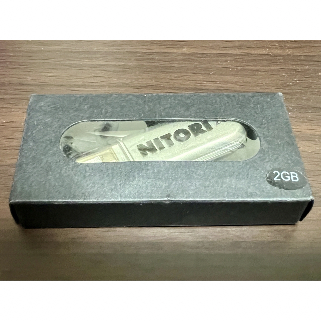 【ノベルティ】ニトリ USBメモリ 2G スマホ/家電/カメラのPC/タブレット(PC周辺機器)の商品写真