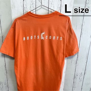 USA古着　Tシャツ　オレンジ　プリント　コットン　Boots & Coots(Tシャツ/カットソー(半袖/袖なし))