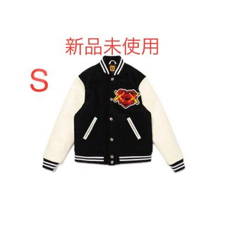 ヒューマンメイド(HUMAN MADE)のKAWS MADE VARSITY JACKET KIDS BLACK(ジャケット/上着)