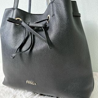 フルラ(Furla)のフルラ コスタンザ トートバッグ A4 シボ革 ブラック 巾着 金ロゴ(トートバッグ)