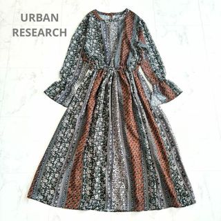 アーバンリサーチ(URBAN RESEARCH)のアーバンリサーチ ヴィンテージ調総柄ワンピース リボン 透け感 花柄 ブラウン系(ロングワンピース/マキシワンピース)