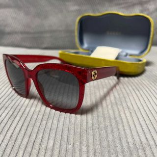 グッチ(Gucci)の新品  GUCCI グッチ サングラス ラメレッド GG0034S 006(サングラス/メガネ)