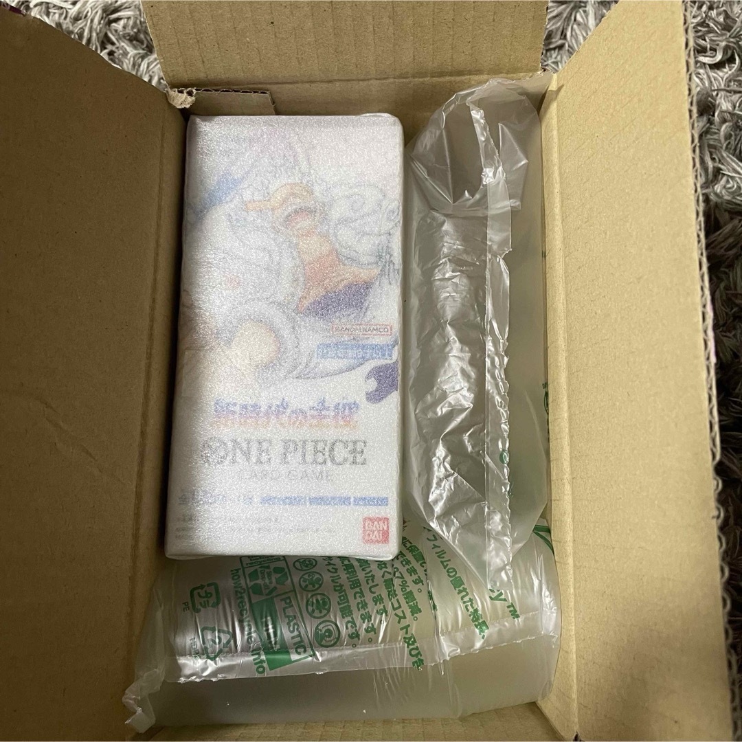 ONE PIECE(ワンピース)のテープ付き 未開封 ワンピースカード ブースターパック 新時代の主役 OP-05 エンタメ/ホビーのトレーディングカード(Box/デッキ/パック)の商品写真