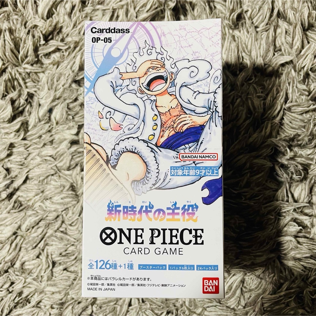 ONE PIECE(ワンピース)のテープ付き 未開封 ワンピースカード ブースターパック 新時代の主役 OP-05 エンタメ/ホビーのトレーディングカード(Box/デッキ/パック)の商品写真