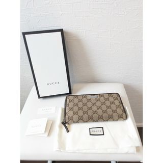 グッチ(Gucci)のGUCCI メタルプレート付きGGキャンバスラウンドジップ長財布  307980(長財布)