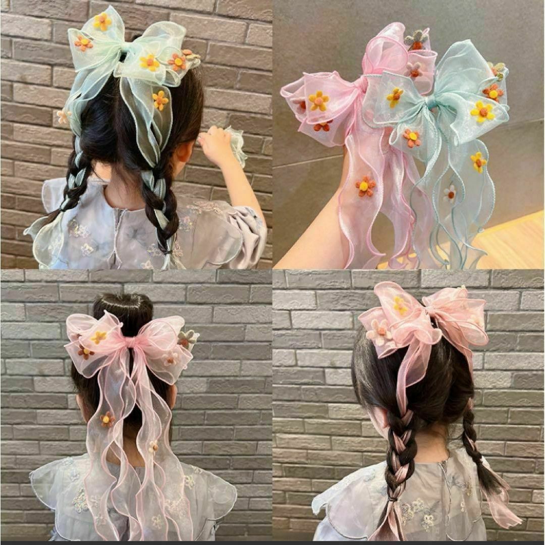 ビックリボン　ヘアークリップ　ヘアーアクセサリー　水色　リボン オシャレキッズ キッズ/ベビー/マタニティのこども用ファッション小物(その他)の商品写真