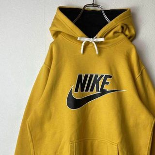 ナイキ(NIKE)の【ビックロゴパーカー】NIKEスウッシュ古着かぶりイエロー　ストリートM長袖(パーカー)