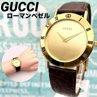 グッチ(Gucci)の美品■稼働 GUCCI ゴールドベゼル レザーバンド メンズ 3000.2M(腕時計)