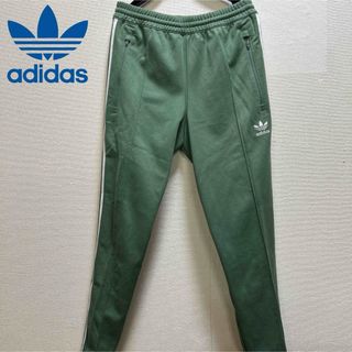 オリジナルス(Originals（adidas）)のアディダスオリジナルス トラックパンツ ファイヤーバード グリーン くすみカラー(スラックス)