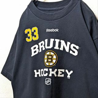 リーボック(Reebok)のリーボックNHLブルーインズ#33チャラ ロゴ Tシャツ ブラック 黒 古着(Tシャツ/カットソー(半袖/袖なし))