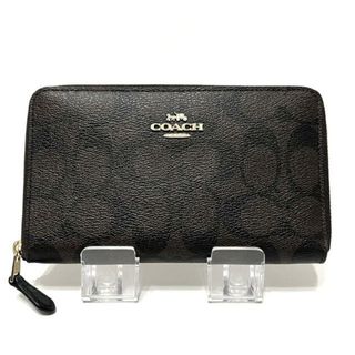 コーチ(COACH)のCOACH(コーチ) 長財布 シグネチャー柄 ダークブラウン ラウンドファスナー PVC(塩化ビニール)(財布)