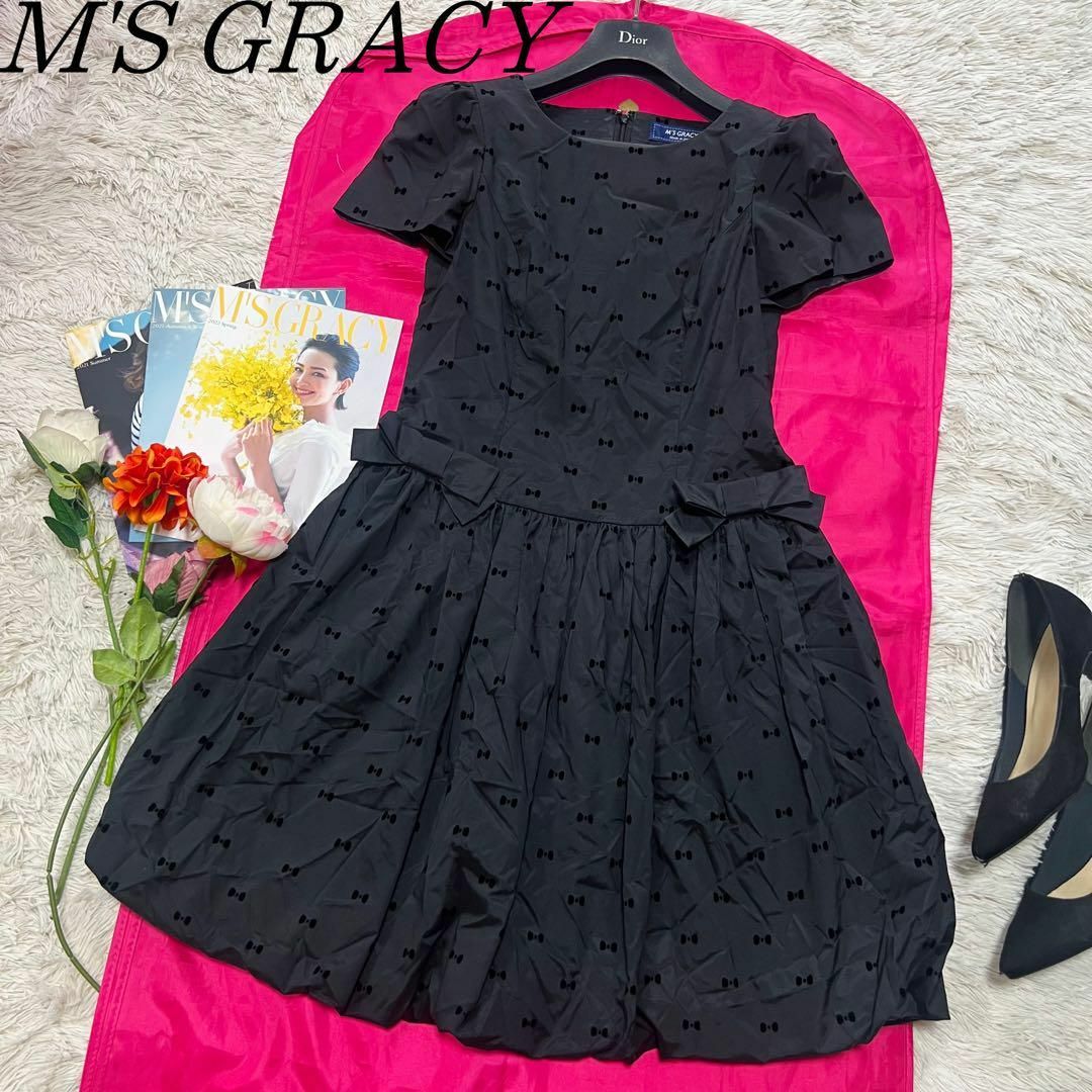 良品】M´S GRACY フレアワンピース ブラック リボン 半袖 膝丈 38 良品】M´S GRACY フレアワンピース ブラック リボン 半袖 膝丈 38