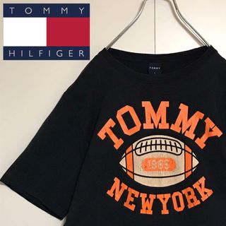 【日本製】トミー　ロゴ入りプリントTシャツ　ブラック　人気L  H798(Tシャツ/カットソー(半袖/袖なし))