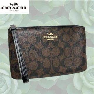 コーチ(COACH)のCOACH コーチ リストレット ポーチ シグネチャー ブラウン×ブラック(ポーチ)