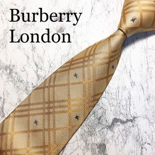 バーバリー(BURBERRY)のBUBERRY LONDON ネクタイ　エンボスチェック　ゴールド　ホースロゴ(ネクタイ)