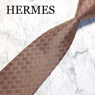 エルメス(Hermes)のHERMES ネクタイ　H柄　オレンジ系(ネクタイ)
