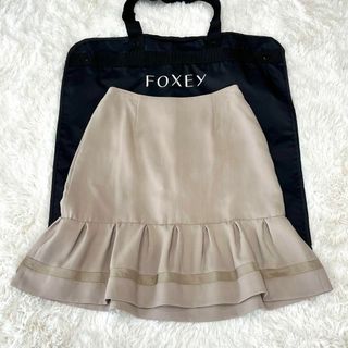 フォクシー(FOXEY)の美品FOXEY Campanella カンパニュラ スカート ピンクベージュ40(ひざ丈スカート)