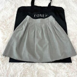 フォクシーニューヨーク(FOXEY NEW YORK)の美品 フォクシーニューヨーク スカート 31667 ダブルタック グレー 38(ひざ丈スカート)