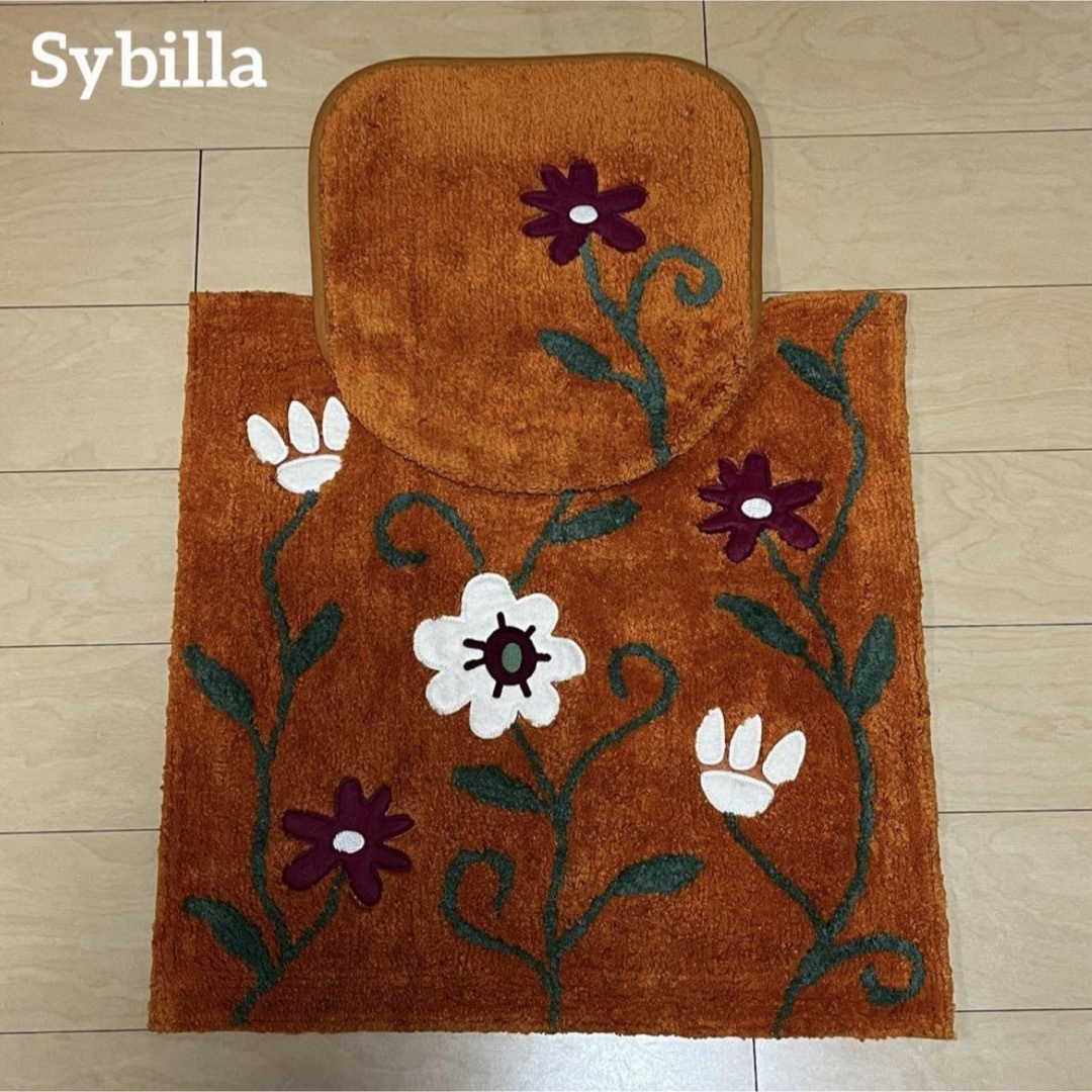 Sybilla(シビラ)の新品【Sybilla】 フラワーガーデン トイレマット フタカバー2点　オレンジ インテリア/住まい/日用品のラグ/カーペット/マット(トイレマット)の商品写真