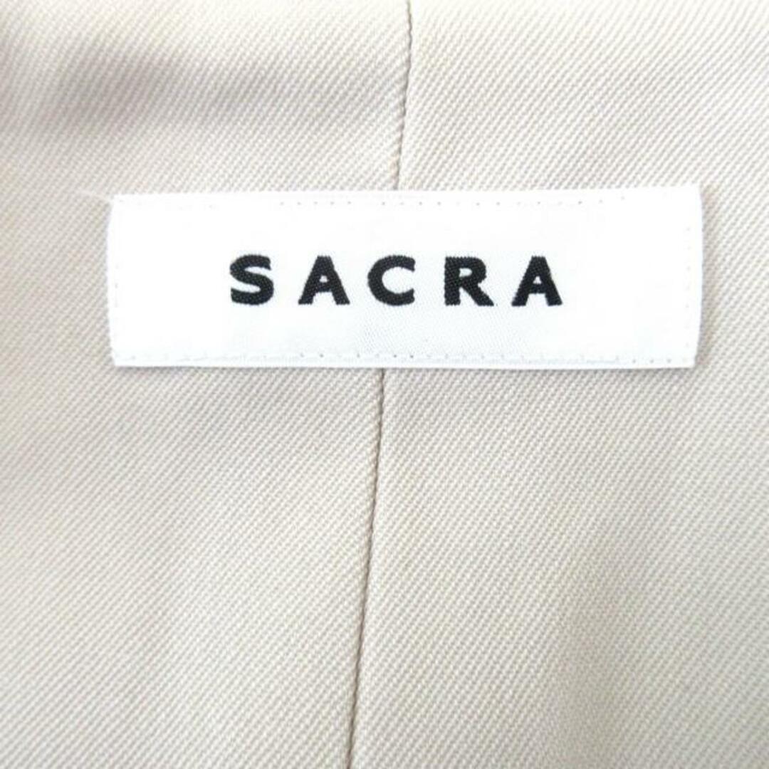 SACRA(サクラ)のSACRA(サクラ) コート サイズ38 M レディース - アイボリー ノースリーブ/ロング丈/秋/冬 レディースのジャケット/アウター(その他)の商品写真