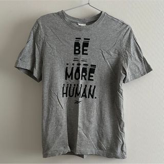 リーボック(Reebok)のヒューマン クルー Tシャツ （ミディアムグレーヘザー）(Tシャツ/カットソー(半袖/袖なし))