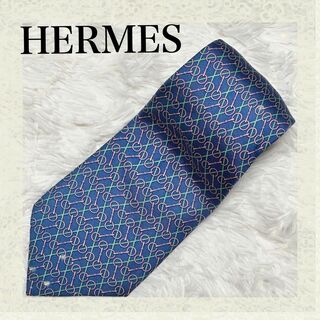 エルメス(Hermes)の【大人　紳士　美品】エルメス　HERMES　レギュラータイ 青色　総柄(ネクタイ)