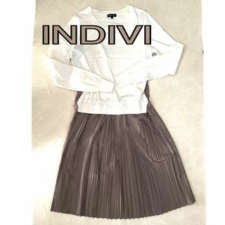 インディヴィ(INDIVI)のインディヴィINDIVI ドッキング ワンピース ニット プリーツ ベージュ 白(ひざ丈ワンピース)