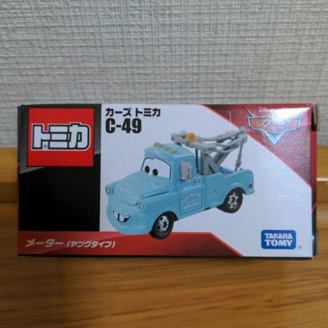 新品未開封 カーズ トミカ C-49   メーター ヤングタイプ エンタメ/ホビーのおもちゃ/ぬいぐるみ(ミニカー)の商品写真