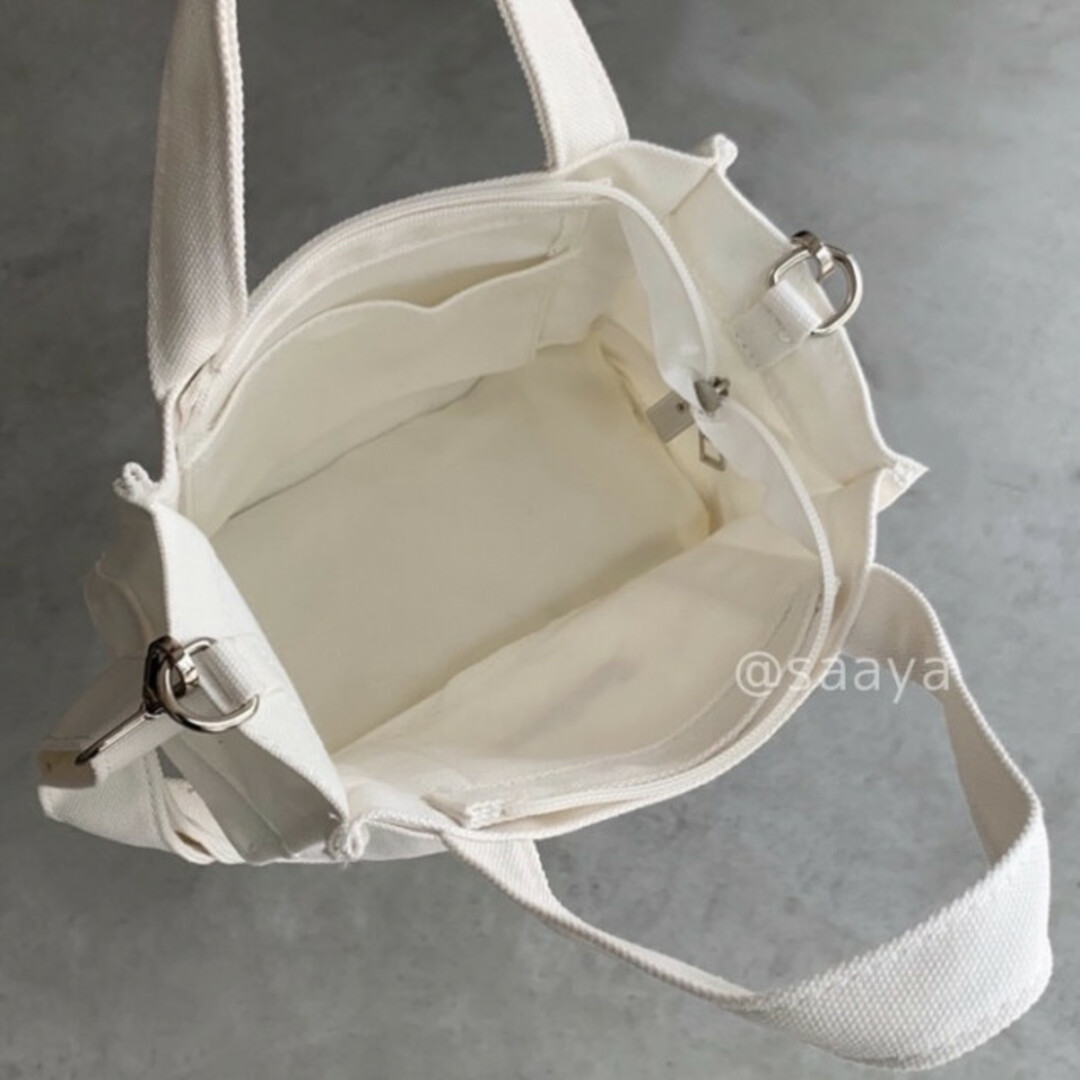 キャンバス mini トートバッグ 肩掛け 斜めがけ 白 新品未使用 美品 英字 レディースのバッグ(ショルダーバッグ)の商品写真