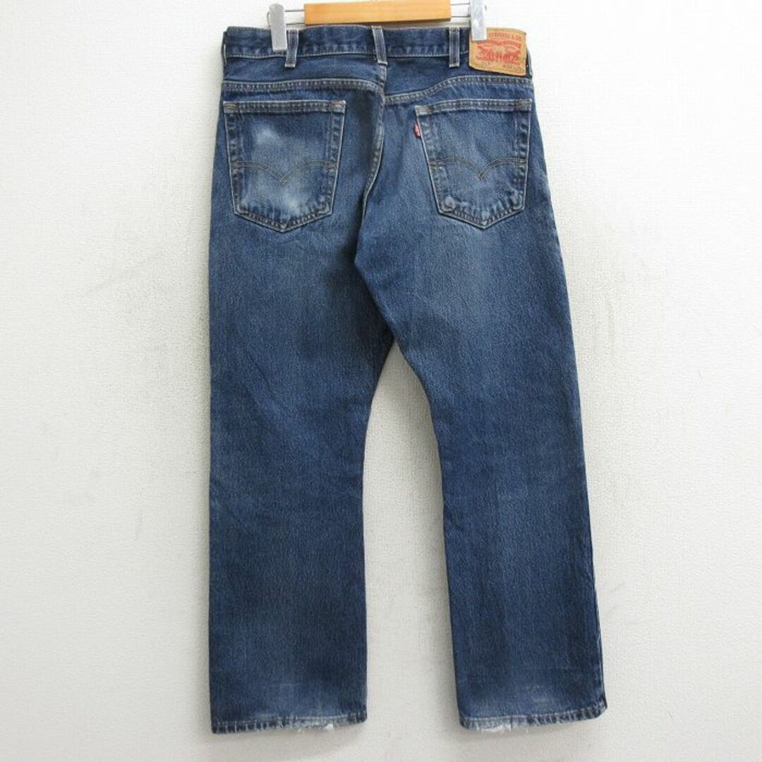 Levi's(リーバイス)のW34★古着 ジーンズ Levis リーバイス 517 メンズ ブーツカット ヒゲ コットン 紺 ネイビー デニム 24may09 中古 ボトムス ジーパン Gパン ロング パンツ メンズのパンツ(ワークパンツ/カーゴパンツ)の商品写真