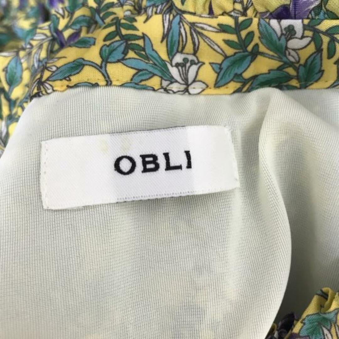 OBLI(オブリ)のOBLI(オブリ) ワンピース サイズS レディース - イエロー×パープル×マルチ ハイネック/半袖/マキシ丈/花柄/ウエストゴム レディースのワンピース(その他)の商品写真