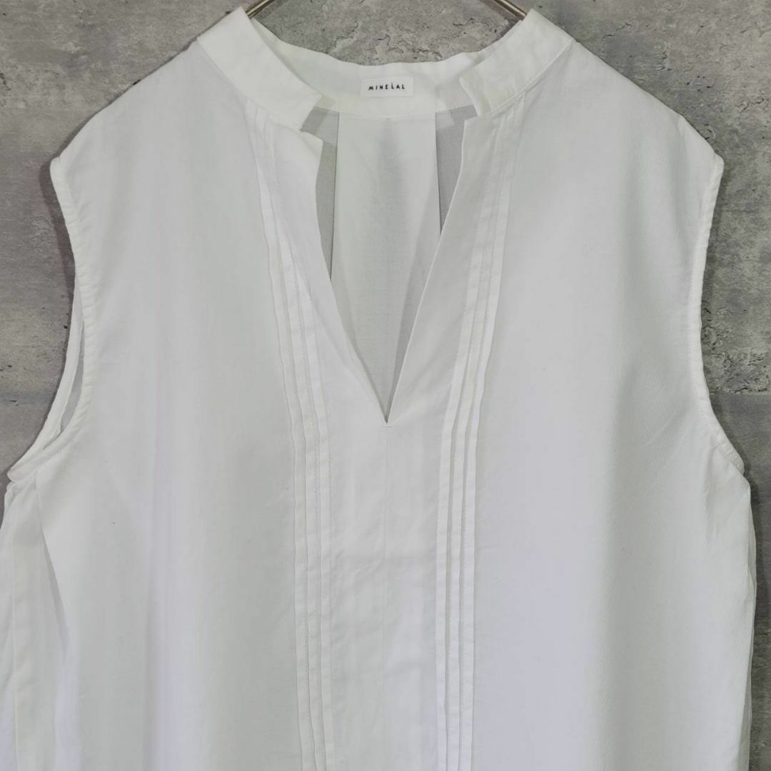 MINELAL(ミネラル)のミネラル インド綿 タッセル付き スキッパー ノースリーブブラウス ホワイト レディースのトップス(シャツ/ブラウス(半袖/袖なし))の商品写真