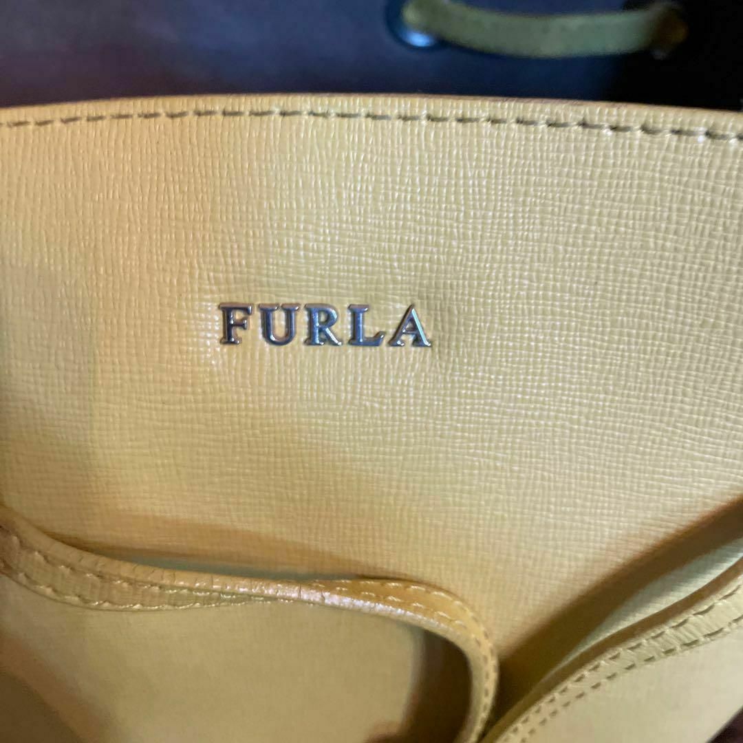 Furla(フルラ)のフルラ ステイシー　2way ショルダーバッグ 巾着　ポーチ付き イエロー レディースのバッグ(ショルダーバッグ)の商品写真