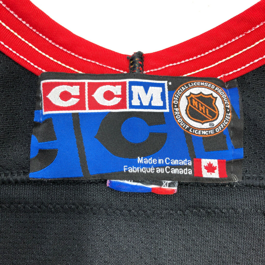 90年代 カナダ製 CCM NHL カルガリー・フレームス ホッケー ゲームシャツ ユニフォーム ブラック (メンズ XL) 中古 古着 Q6256 スポーツ/アウトドアのスポーツ/アウトドア その他(その他)の商品写真