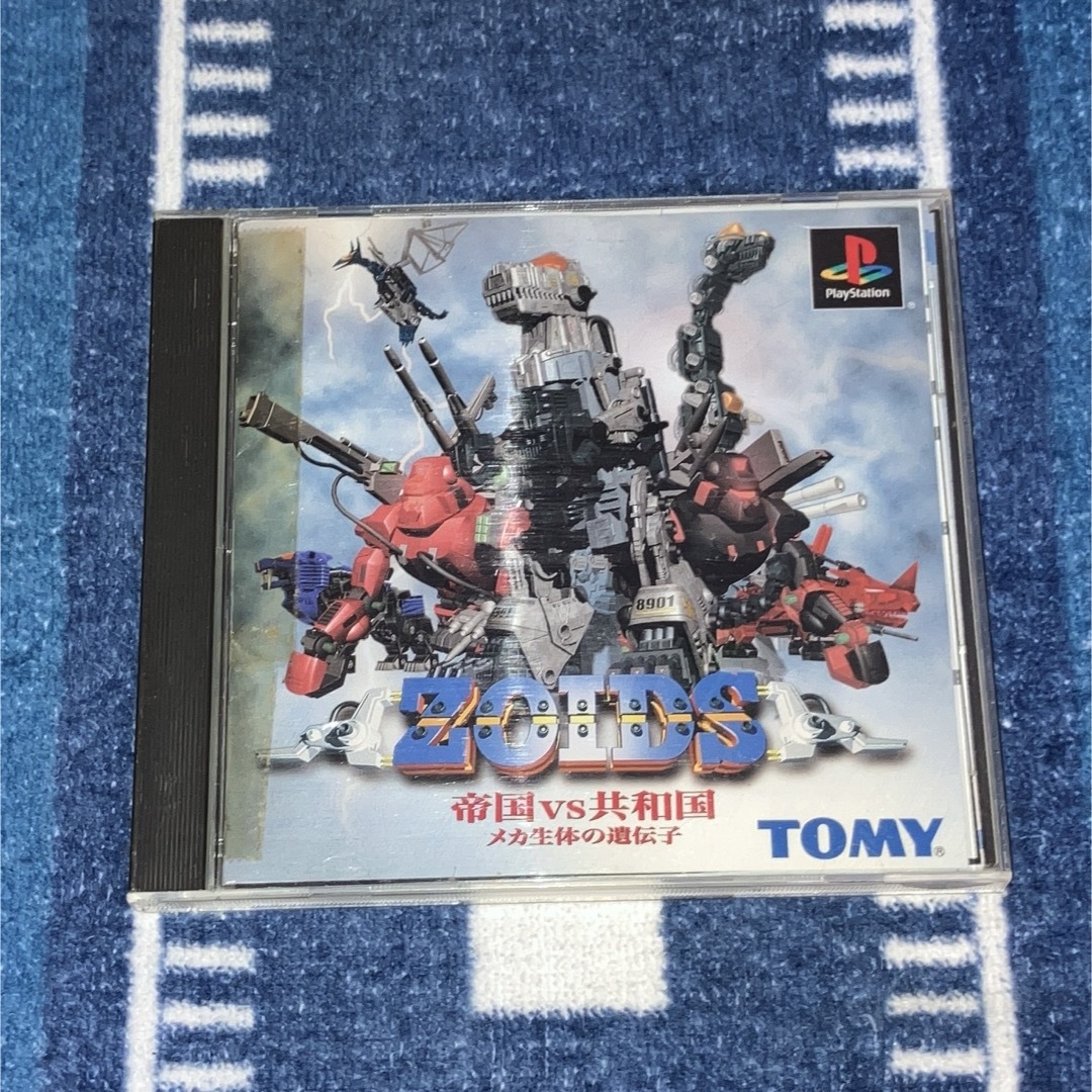 PlayStation(プレイステーション)のPS ZOIDS 帝国vs共和国 メカ生体の遺伝子 エンタメ/ホビーのゲームソフト/ゲーム機本体(家庭用ゲームソフト)の商品写真