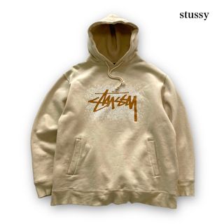 ステューシー(STUSSY)の【stussy】ステューシー センターロゴ スウェットパーカー 飛び散りロゴ(パーカー)