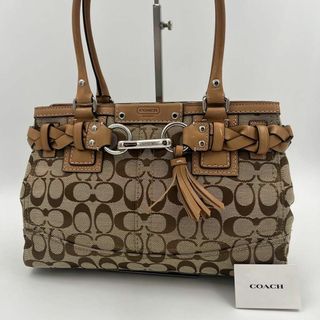 コーチ(COACH)の【極美品】coach ハンドバッグ　シグネチャー　タッセル　ベルト　金具　茶系(ハンドバッグ)