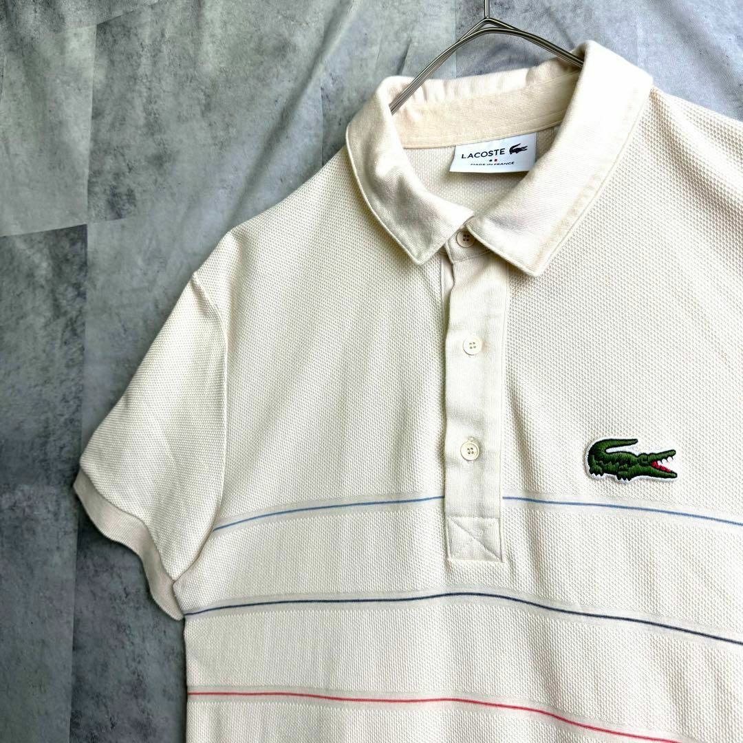 LACOSTE(ラコステ)の美品 フランス製 ラコステ 鹿子ポロシャツ 半袖 ボーダー 刺繍ロゴ ベージュM メンズのトップス(ポロシャツ)の商品写真