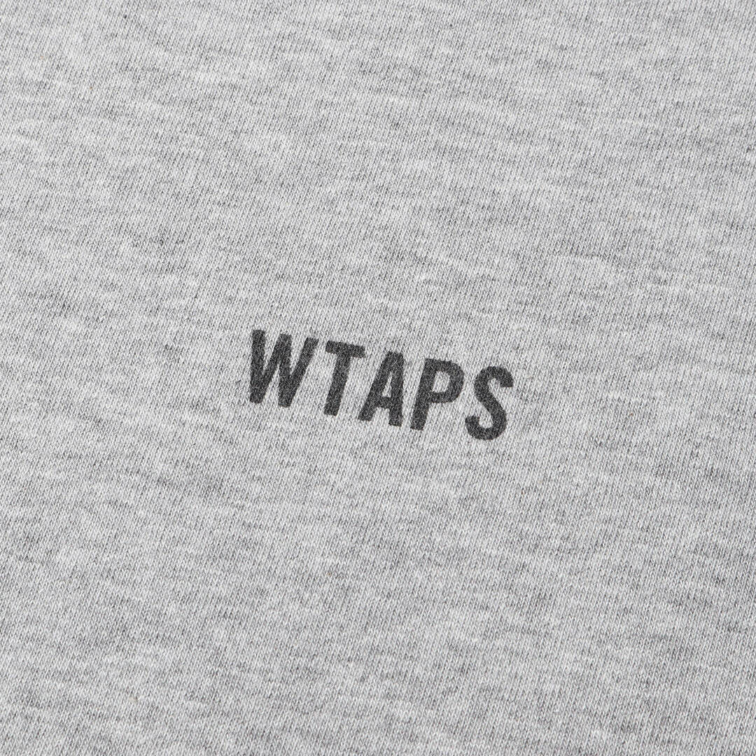 W)taps(ダブルタップス)のWTAPS ダブルタップス Tシャツ サイズ:L オーバルロゴ クルーネック 半袖Tシャツ グレー トップス カットソー【メンズ】【中古】 メンズのトップス(Tシャツ/カットソー(半袖/袖なし))の商品写真
