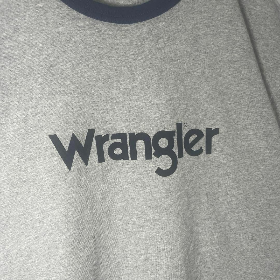 Wrangler(ラングラー)の[古着]ラングラー　半袖　リンガーTシャツ　プリント　アメカジ　グレー　ネイビー メンズのトップス(Tシャツ/カットソー(半袖/袖なし))の商品写真