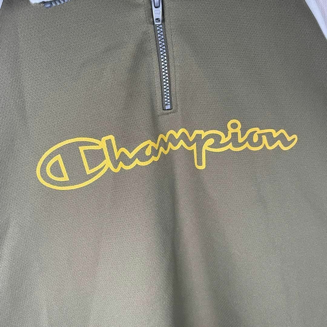 Champion(チャンピオン)の[古着]チャンピオン　半袖　Tシャツ　ハーフジップ　アームライン　カーキ　黄色 メンズのトップス(Tシャツ/カットソー(半袖/袖なし))の商品写真