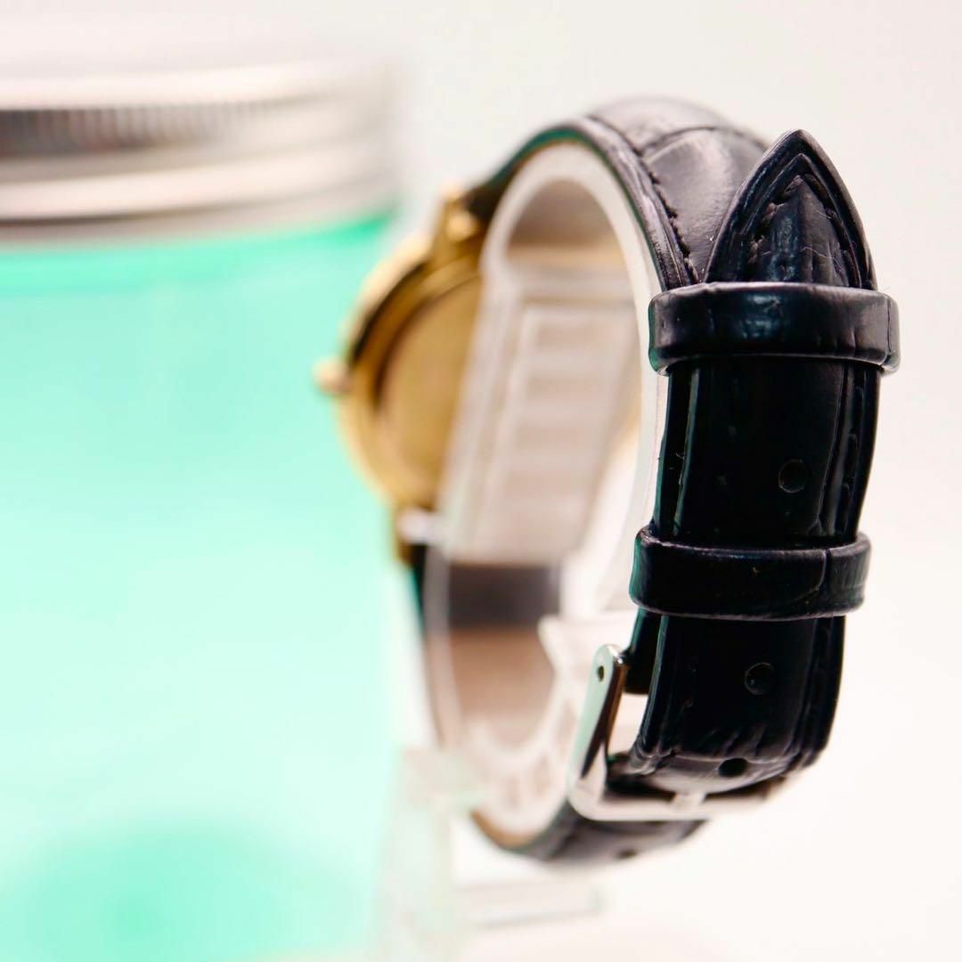 Gucci(グッチ)の良品 GUCCI ローマンベゼル ラウンド ブラック メンズ腕時計 705 メンズの時計(腕時計(アナログ))の商品写真