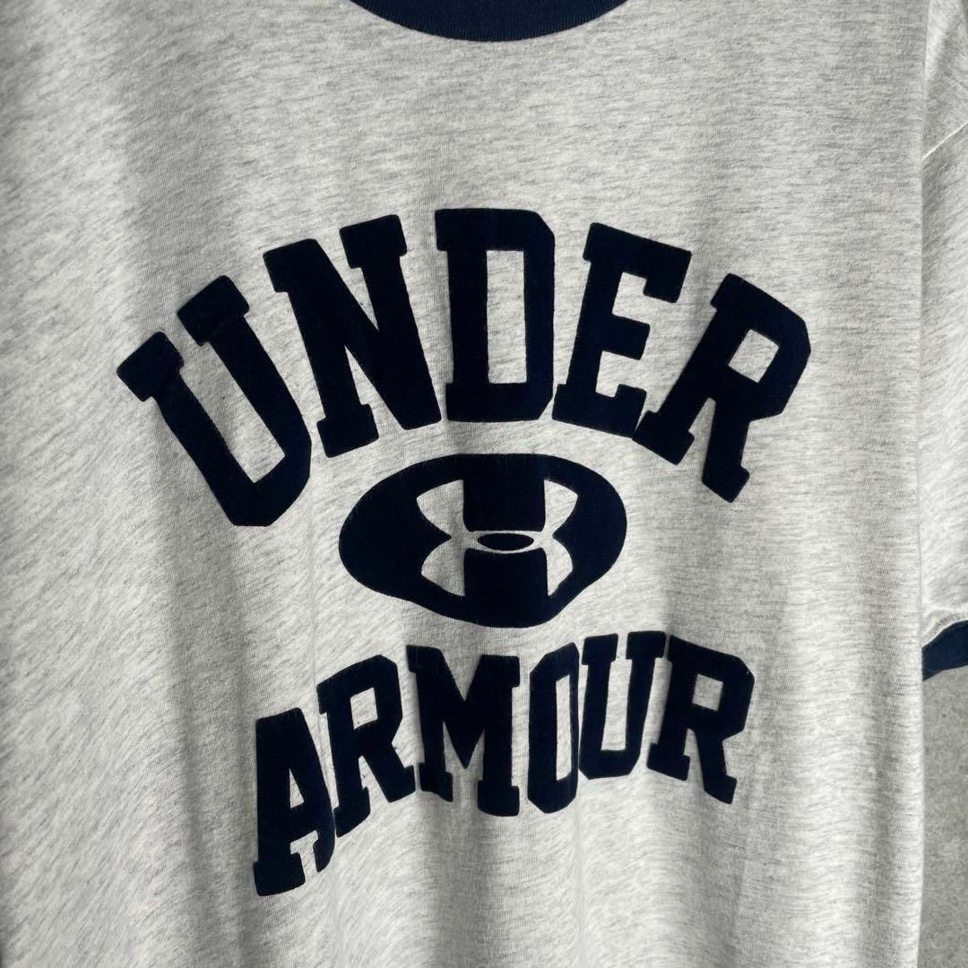 UNDER ARMOUR(アンダーアーマー)の[古着]アンダーアーマー　半袖　リンガーTシャツ　ワッペンロゴ　白　ネイビー メンズのトップス(Tシャツ/カットソー(半袖/袖なし))の商品写真