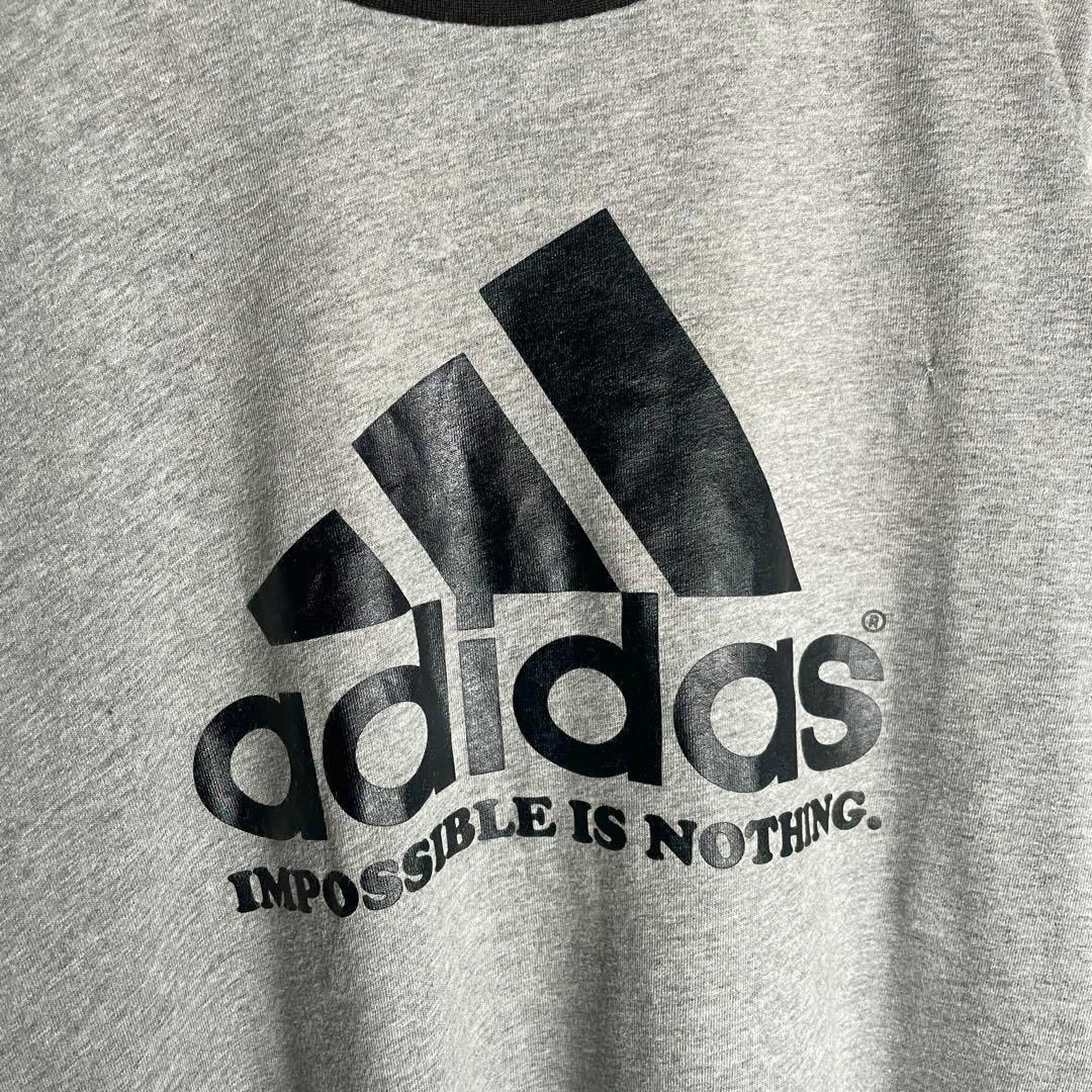 adidas(アディダス)の[古着]アディダス　半袖　リンガーTシャツ　プリント　パフォーマンスロゴ　グレー メンズのトップス(Tシャツ/カットソー(半袖/袖なし))の商品写真