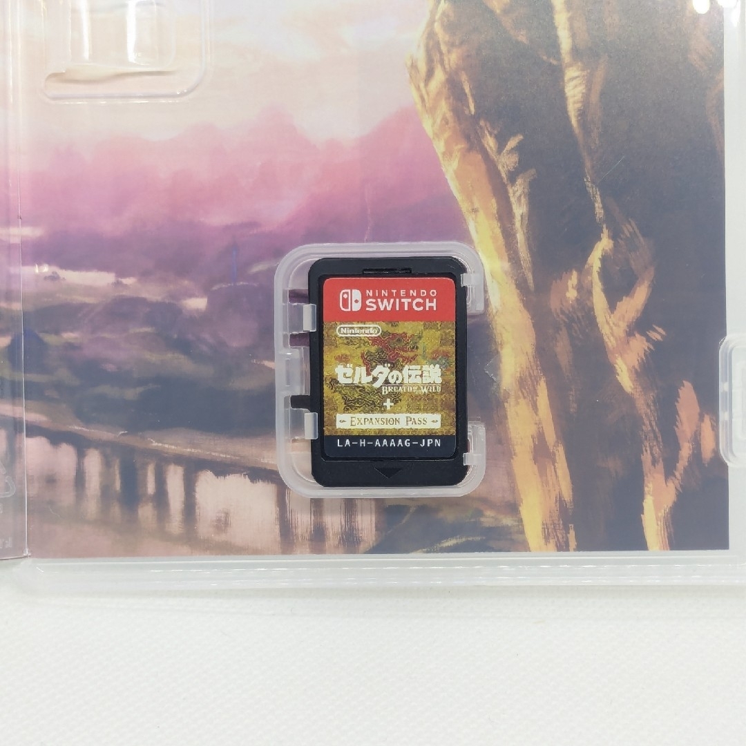 Nintendo Switch(ニンテンドースイッチ)のゼルダの伝説 ブレス オブ ザ ワイルド ＋ エキスパンションパス 動作確認済み エンタメ/ホビーのゲームソフト/ゲーム機本体(家庭用ゲームソフト)の商品写真