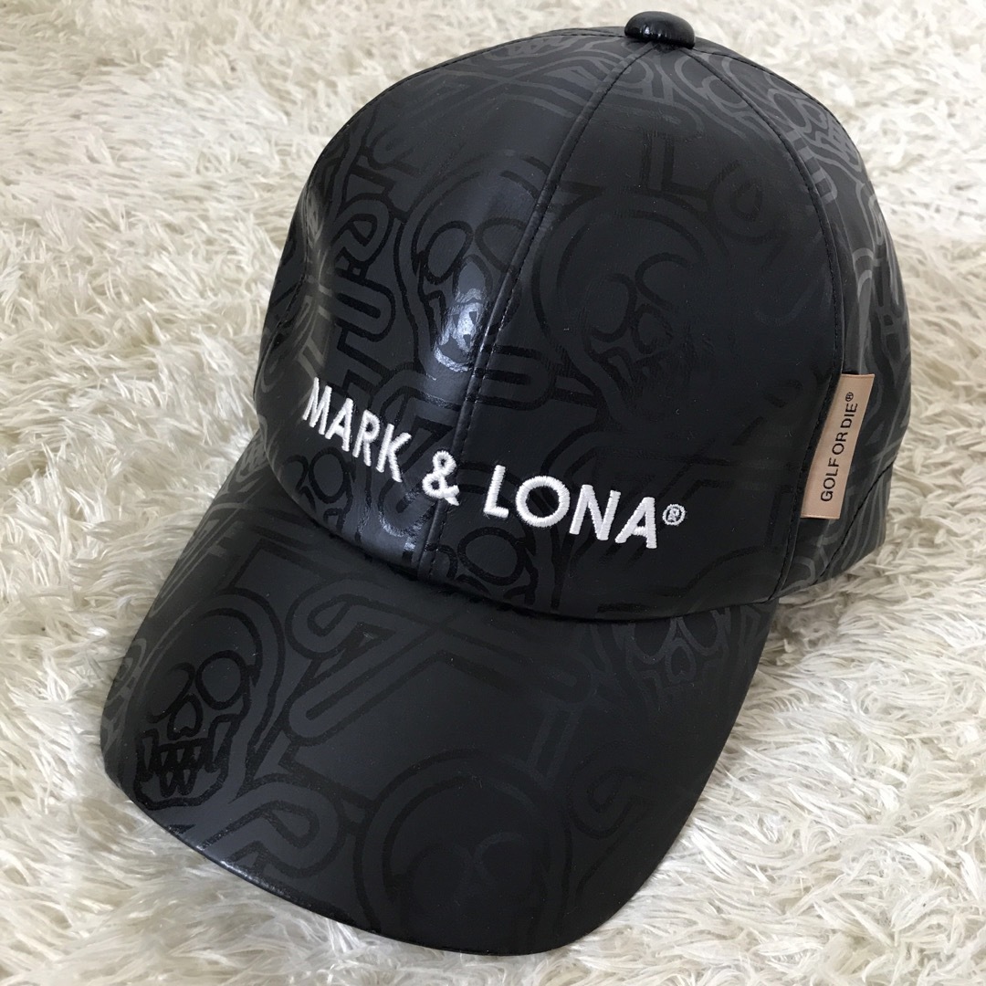 MARK&LONA(マークアンドロナ)のマークアンドロナ　キャップ　帽子　スカル　総柄　ブラック　2022年モデル　黒 スポーツ/アウトドアのゴルフ(その他)の商品写真