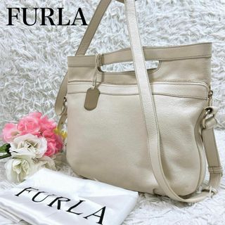 フルラ(Furla)の■FURLA 2way 変形ショルダーバッグ レザー チャーム オフホワイト(ショルダーバッグ)