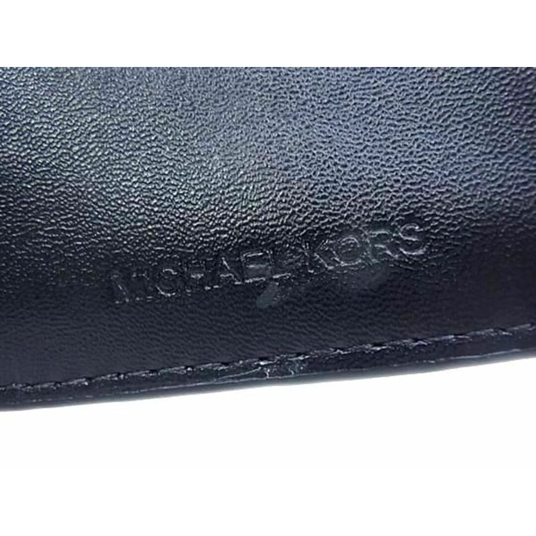 Michael Kors(マイケルコース)の■新品■未使用■ MICHAEL KORS マイケルコース MK柄 PVC×レザー 二つ折り 財布 ウォレット ブラック系×ピンク系 BJ2001  レディースのファッション小物(その他)の商品写真